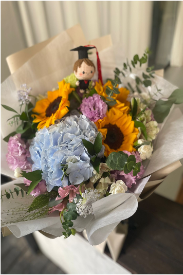 Threads of Joy, Petals of Pride - knitted doll